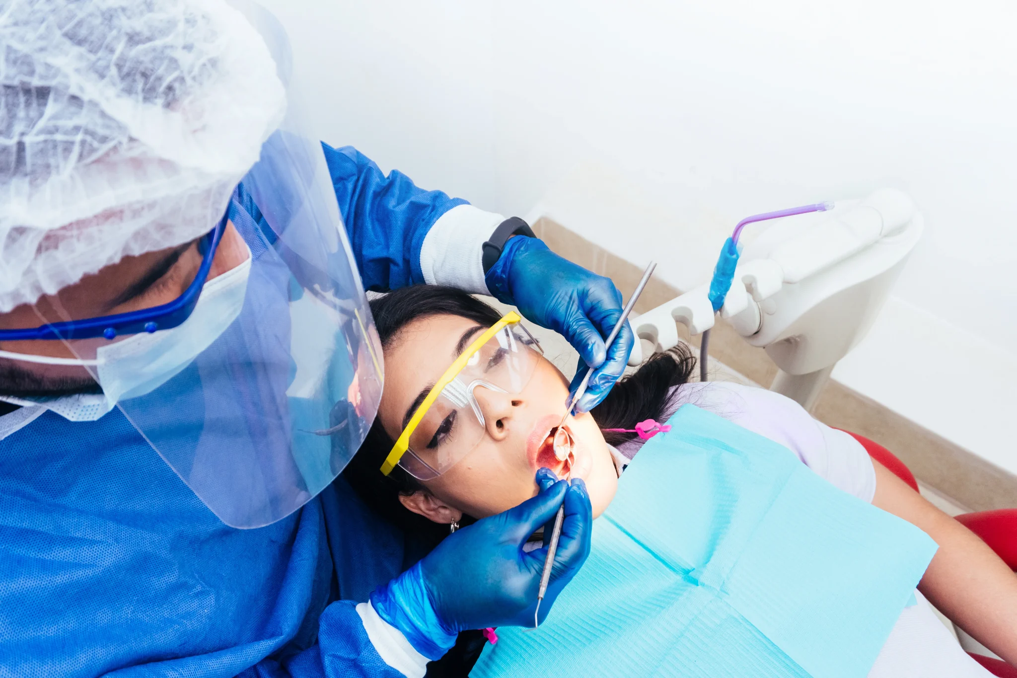 endodontic in Dentist Fernley, performing endodontic exam on female patient for a endodontic in Fernley check up