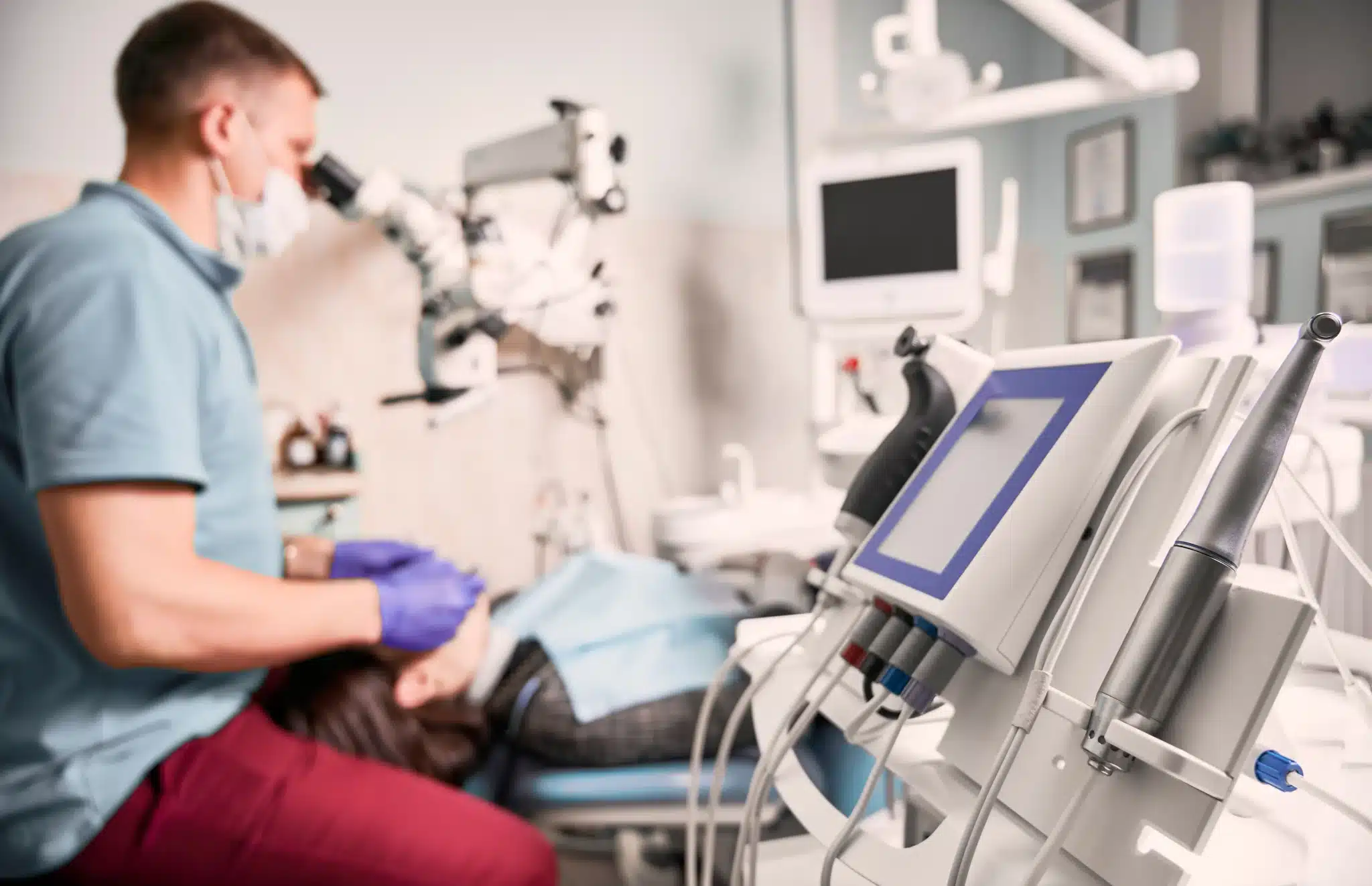 Dentist examining patient in modern endodontic in Fernley clinic